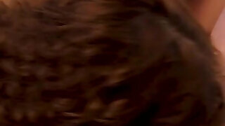 Curly-haired milf swallows cock deep into her throat