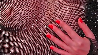 A Beauty with Cute Tits and in Beautiful Lingerie Watches Porn and Caresses Herself